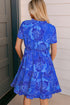 Garden Party Floral Outline Ruffle Hem Tiered Mini Dress